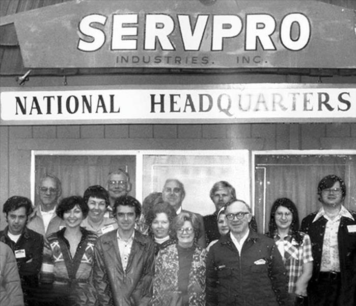 An Employee photo in front of the original SERVPRO in 1969