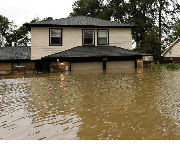 Why Choose Servpro - image of flooded home